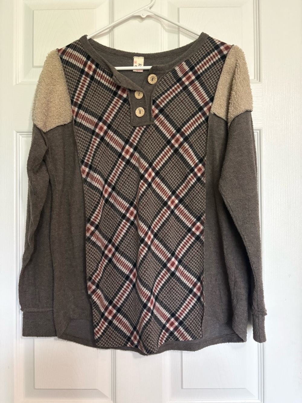 7th ray brown flannel long sleeve fits like a medium/large